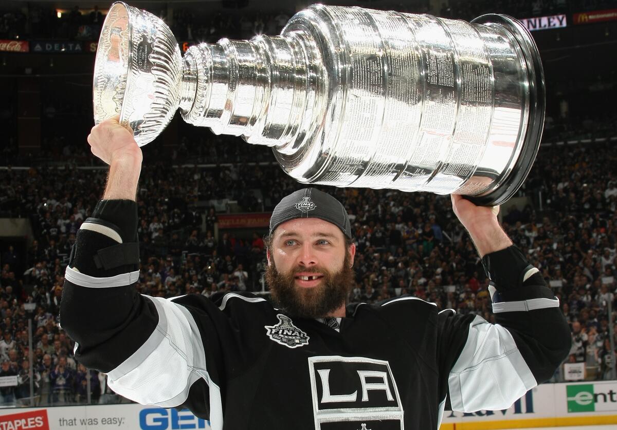 Kings forward Dustin Penner celebrates with the Stanley Cup following the team's victory over the New Jersey Devils in 2012.