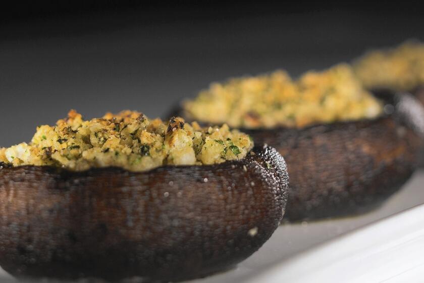 Recipe: Portobello mushroom caps stuffed with parsley, garlic and matzo meal.
