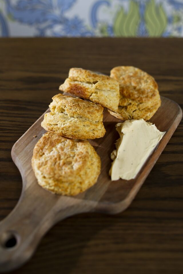 Buttermilk biscuits with burnt-orange honey butter, for $2.