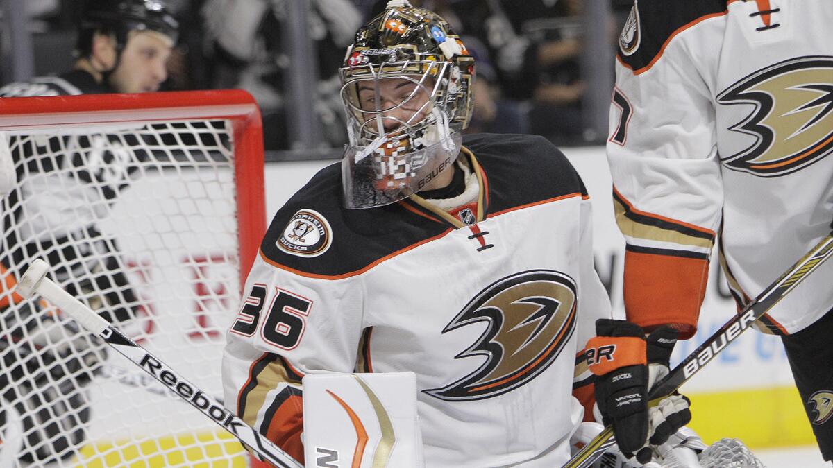 Ducks goalie John Gibson makes a save during an exhibition game against the Kings at Staples Center on Sept. 24.
