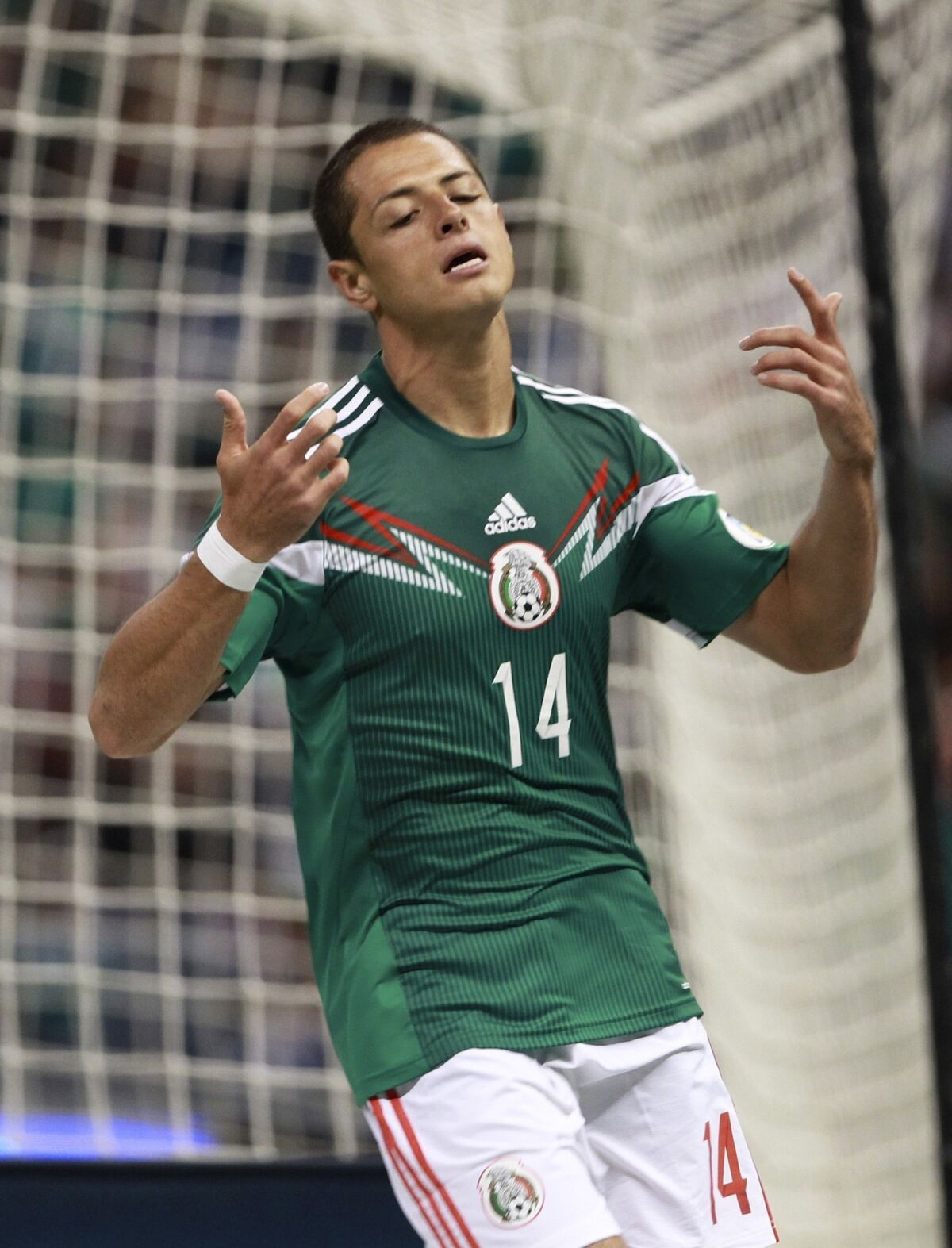 Mexico's Javier Hernandez reacts after failing to convert on a scoring chance in a win over Panama on Friday. If Mexico fails in its quest to qualify for the World Cup, the result could be costly.