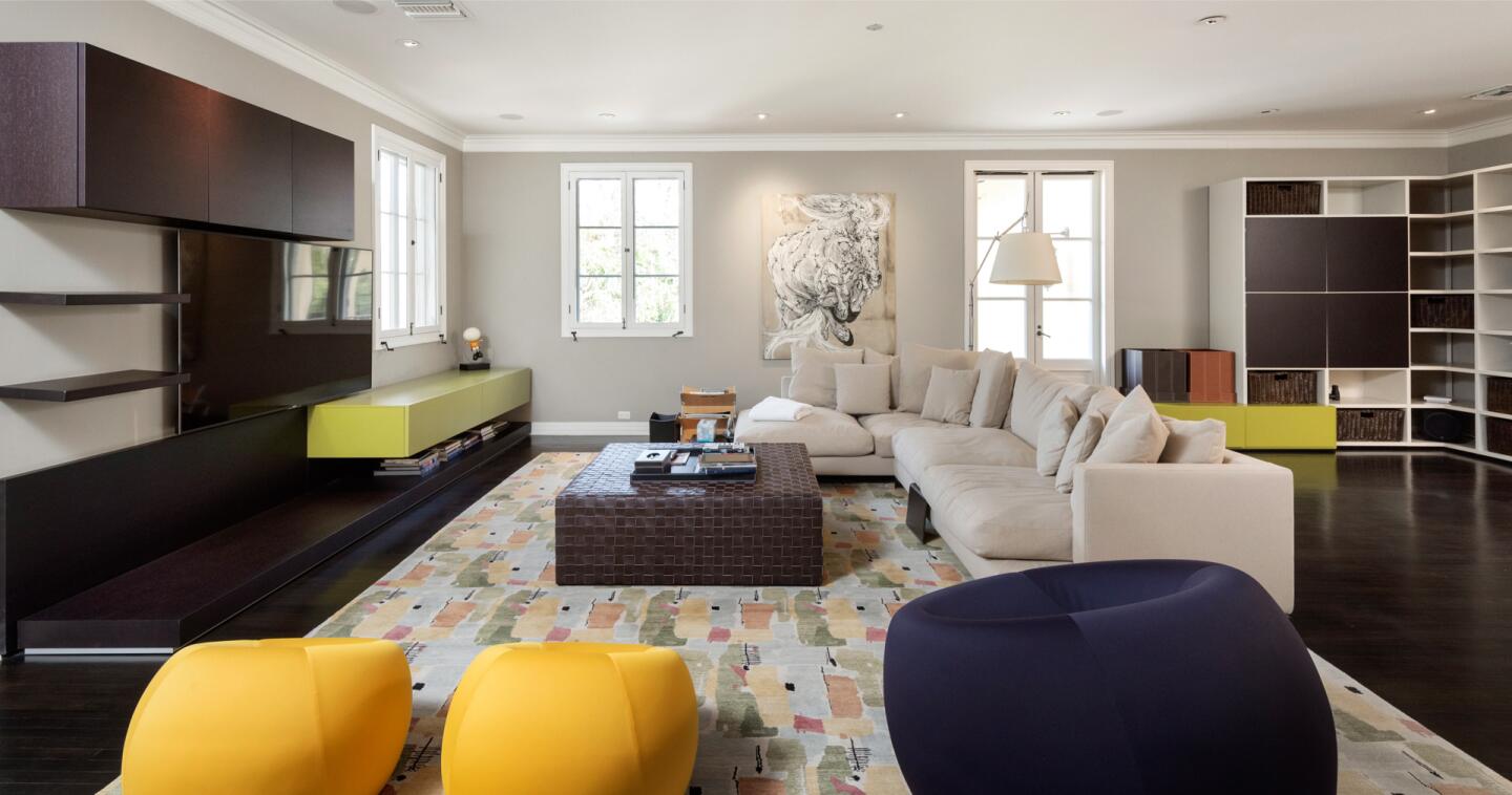 Dark wood floors in an airy room.