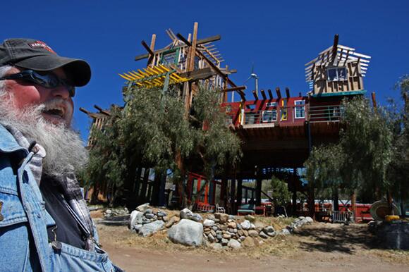 Alan Kimble Fahey stands in front of the partially finished structure, which code enforcers ordered him to stop working on. http://articles.latimes.com/2011/may/26/local/la-me-phonehenge-west-20110526 http://framework.latimes.com/2011/05/25/phonehenge/