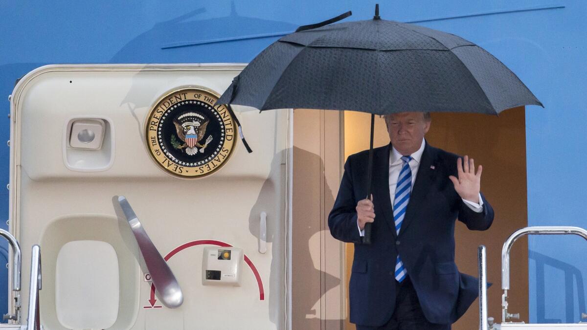 President Trump steps from Air Force One in Osaka, Japan, ahead of the Group of 20 summit on June 27, 2019.