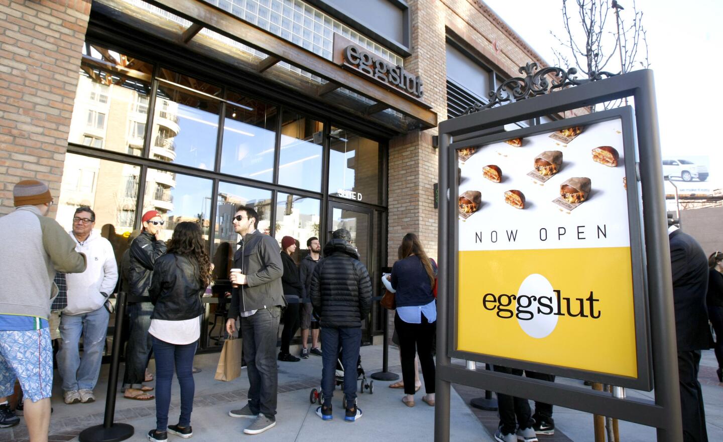 Customers line up to be among the first to eat at the new Eggslut eatery on Brand Blvd. in Glendale, on Thursday, March 23, 2017.
