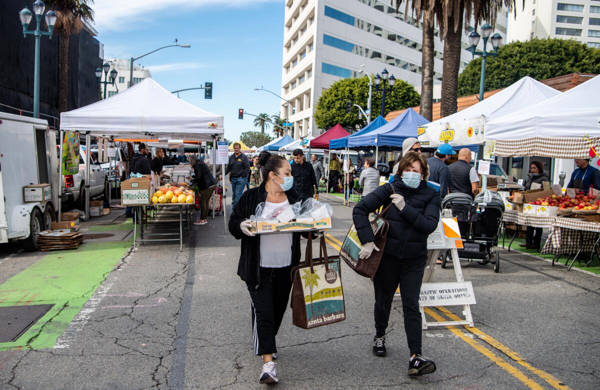 Foot traffic was lighter than usual at the Santa Monica Farmers Market, though vendors remained busy.