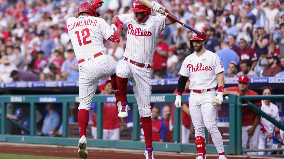 Harper, Schwarber 2 HRs, Thomson wins debut, Phils top Halos