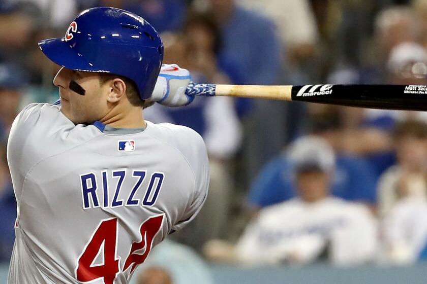 Chicago's Anthony Rizzo hits a solo home run in the fifth inning against the Dodgers on Oct. 19.