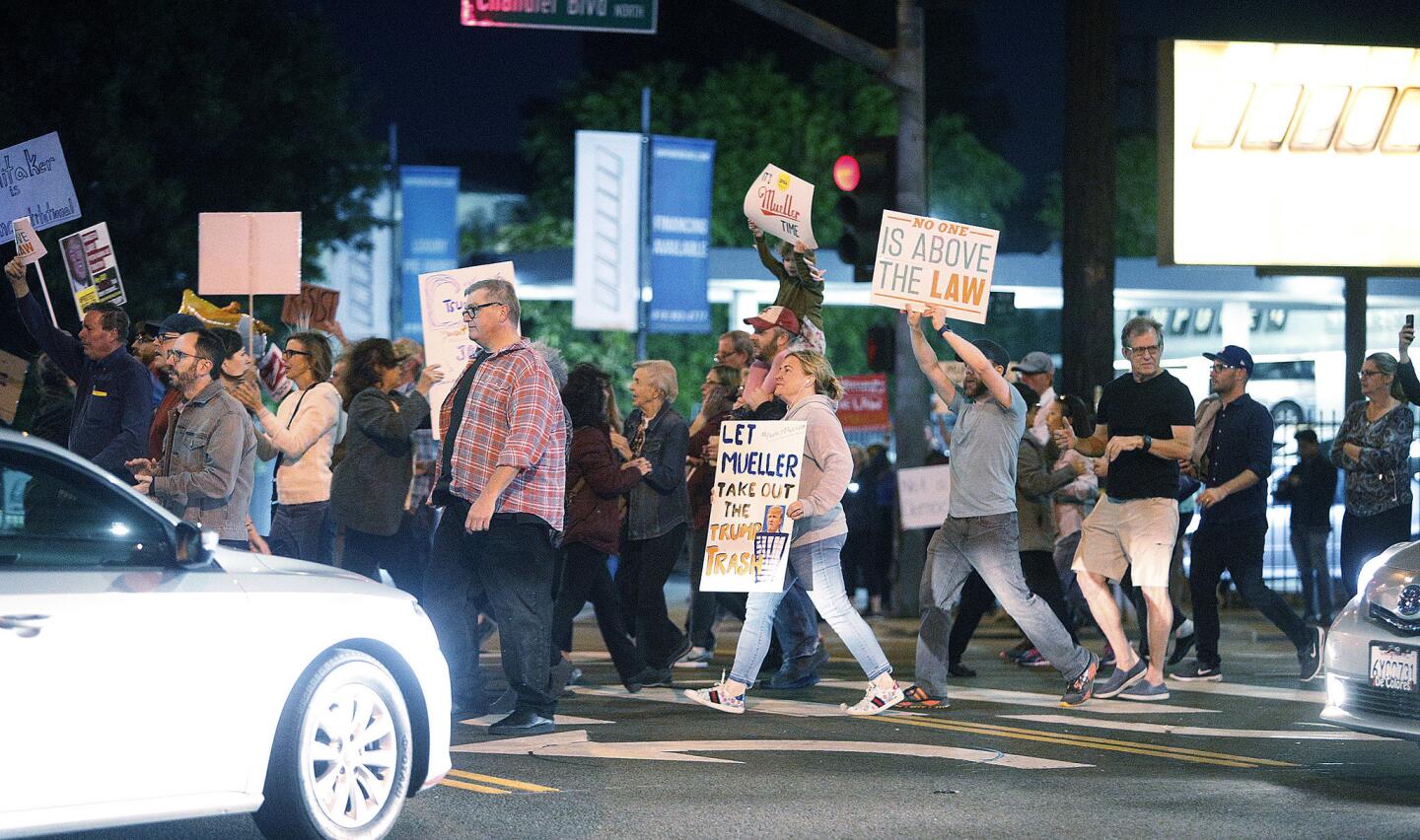 Photo Gallery: Protest in Burbank to support Mueller investigation after dismissal of Attorney General Sessions