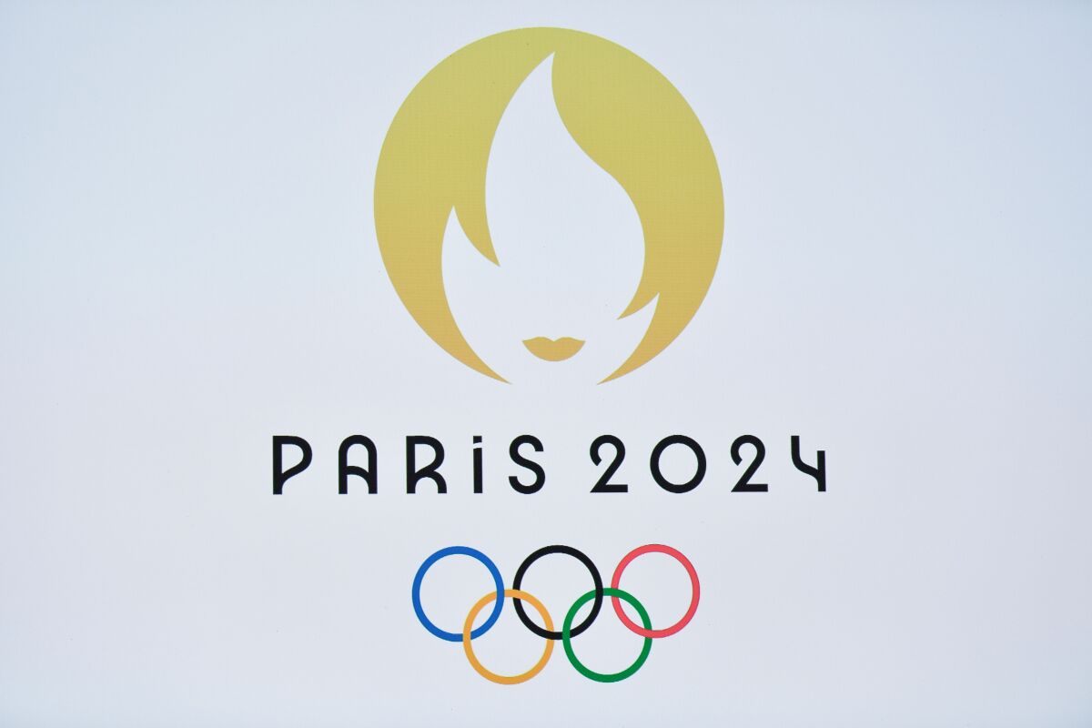 The new logo for the 2024 Summer Olympics in Paris is meant to combine the images of a gold medal, the Olympic flame and French national symbol Marianne.