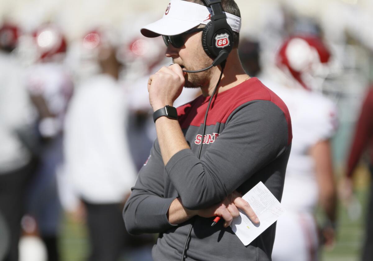 Oklahoma coach Lincoln Riley stands on the sidelines during a game against Baylor on Nov. 13.