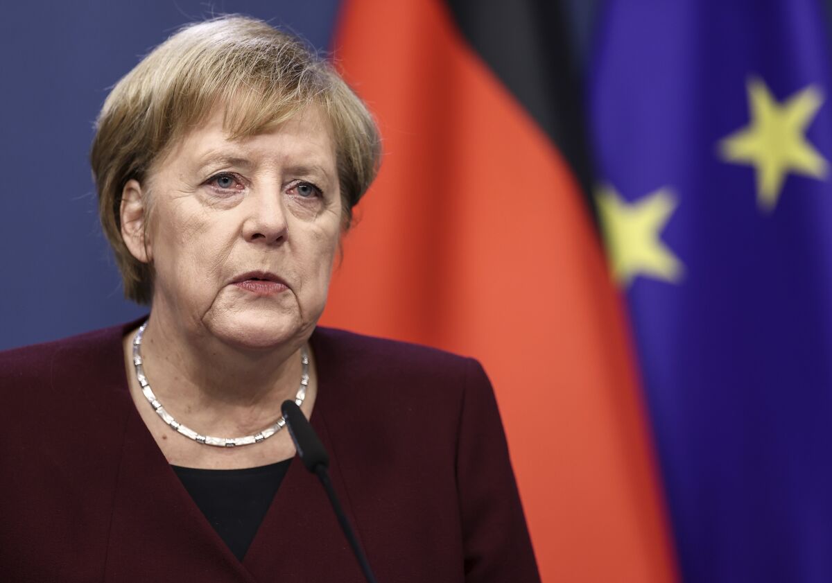 German Chancellor Angela Merkel speaks during a media conference at the end of an EU summit in Brussels, Friday, Oct. 16, 2020. European Union leaders met for the second day of an EU summit, amid the worsening coronavirus pandemic, to discuss topics on foreign policy issues. (Kenzo Tribouillard, Pool via AP)
