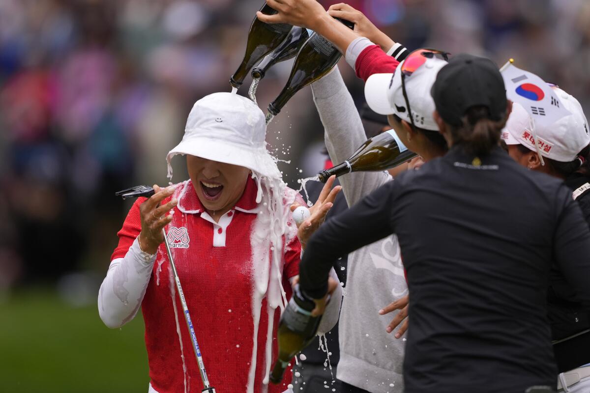 Amy Yang is doused after winning the Women's PGA Championship on Sunday.