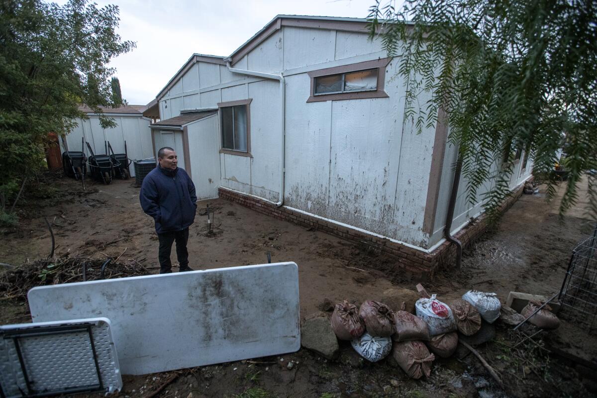 Walter examines the damage.