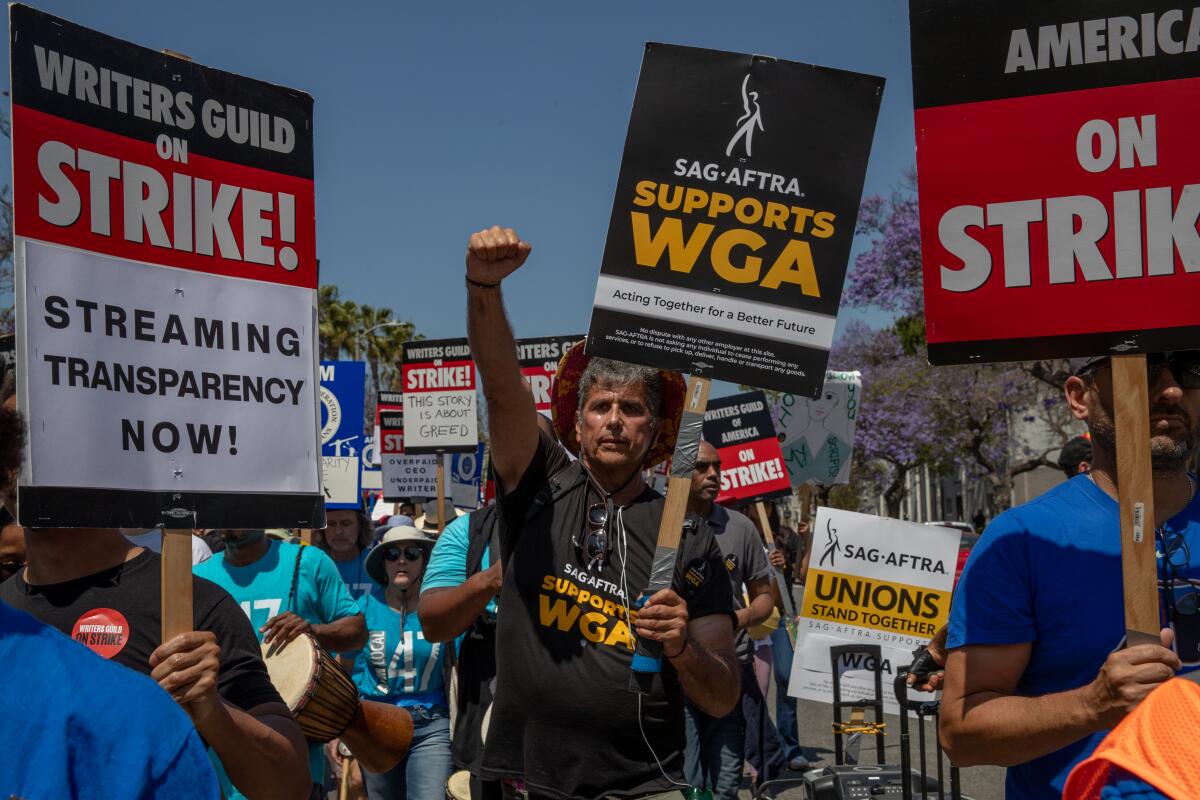 Striking members of the Writers Guild of America and supporters march towards La Brea Tar Pits in Los Angeles in June.