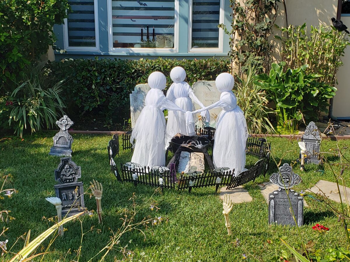 Could these ghouls be summoning zombies from their graves?
