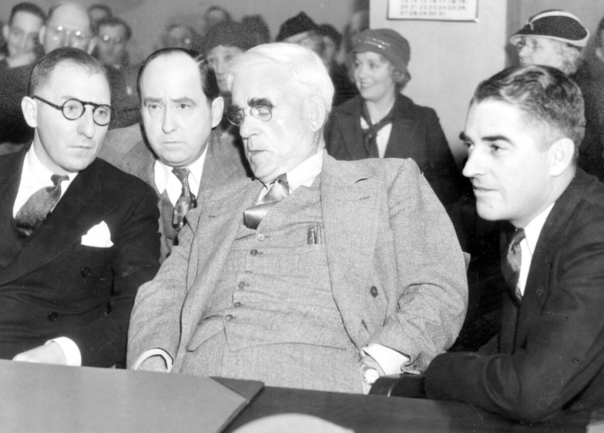 From left, Dist. Atty. Buron Fitts and attorneys Jerry Giesler, Joseph Scott and Jack Gilchrist in 1934.