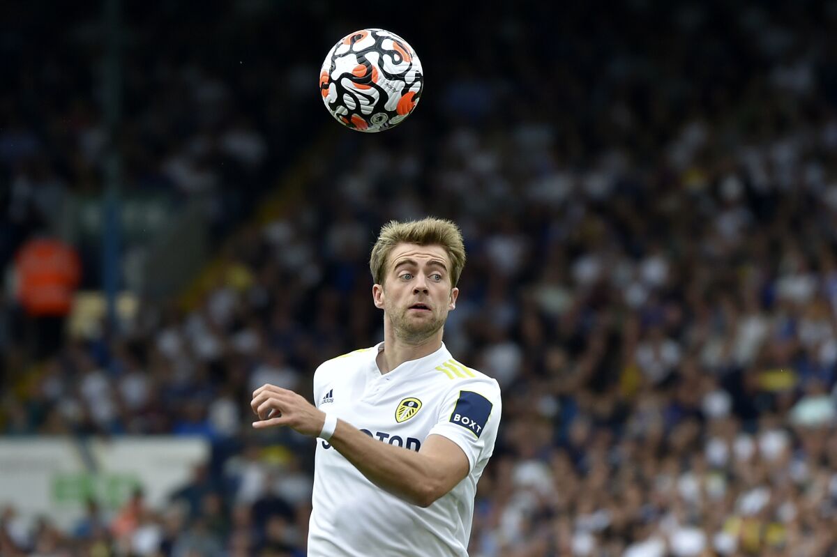 FILE - Leeds United's Patrick Bamford during the English Premier League soccer match between Leeds United and Liverpool at Elland Road, Leeds, England, on Sept. 12, 2021. Leeds striker Patrick Bamford could return from injury to help the Premier League club’s relegation battle. Bamford has been limited to nine league appearances this season but manager Jesse Marsch is hopeful for Sunday’s game against Brighton at Elland Road. (AP Photo/Rui Vieira, File)