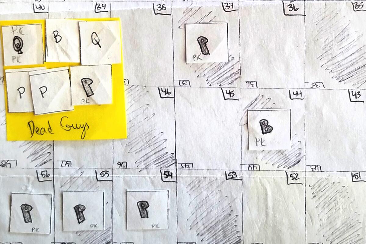A pencil-drawn chessboard. Chess pieces that have been killed are gathered on a yellow sheet labeled "dead guys."