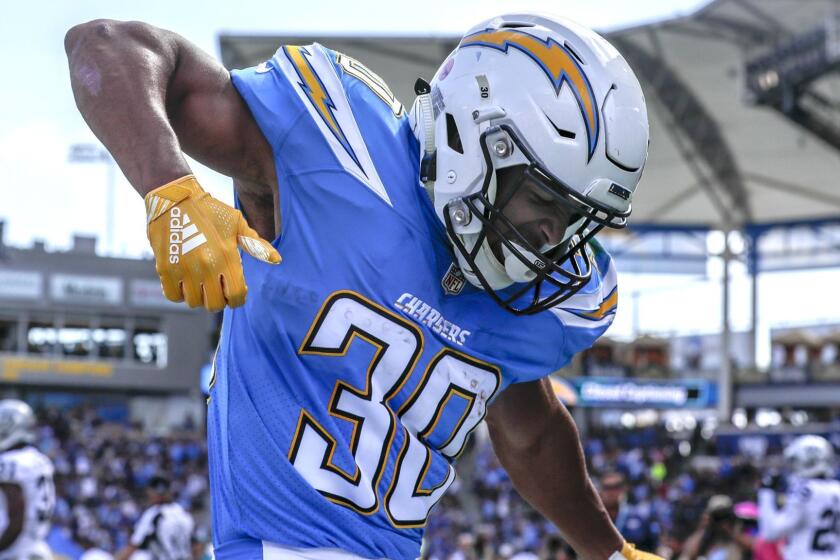 CARSON, CA, SIUNDAY, OCTOBER 7, 2018 - Chargers running back Austin Ekeler dances in the end zone after scoring a touchdown on a 44-yard scereen pass from Philip Rivers at StubHub Center. (Robert Gauthier/Los Angeles Times)