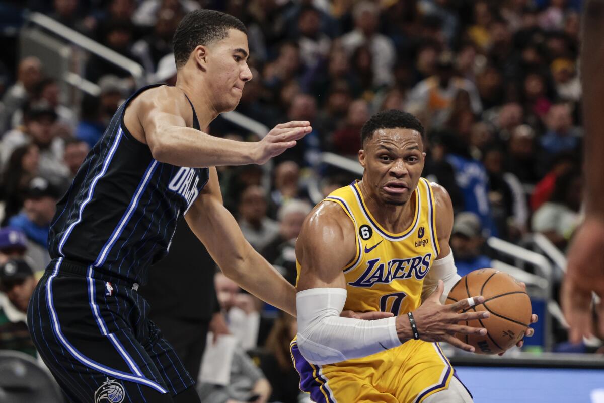 Russell Westbrook drives against Orlando's Caleb Houstan during the second half.