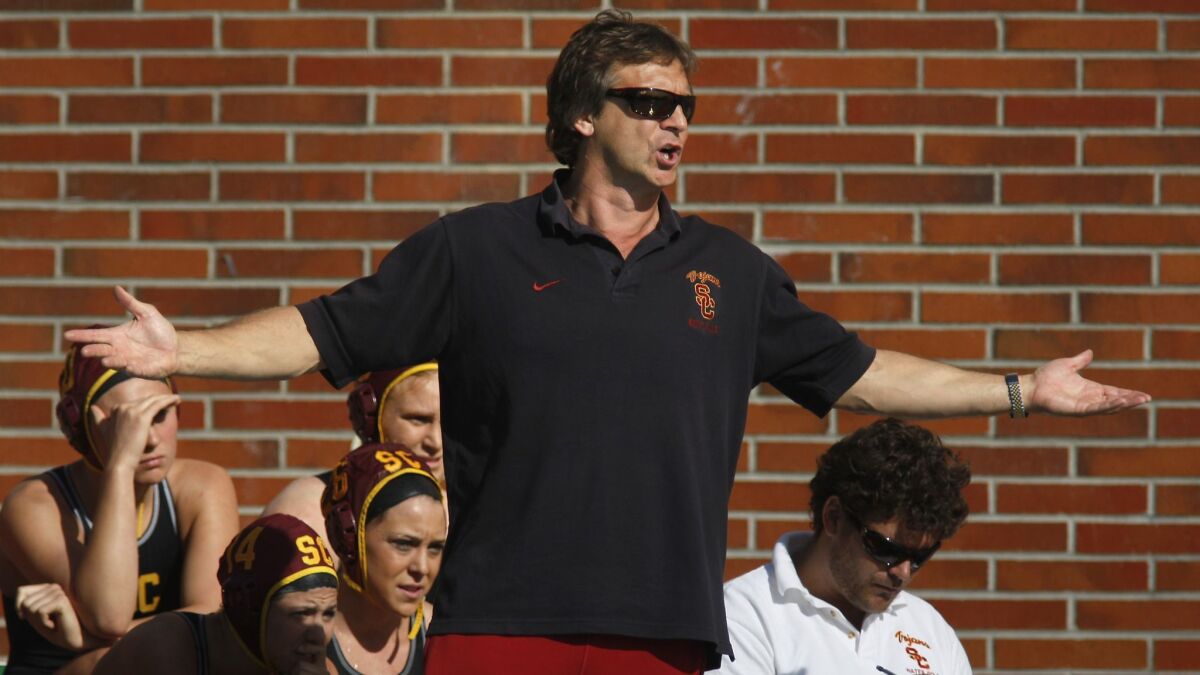 USC water polo coach Jovan Vavic roams the sidelines during a scrimmage against UCLA on Jan. 29, 2011.