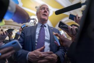 FILE - Sen. John Cornyn, R-Texas, is surrounded by reporters as he heads to the chamber at the Capitol in Washington, Feb. 7, 2024. (AP Photo/J. Scott Applewhite, File)