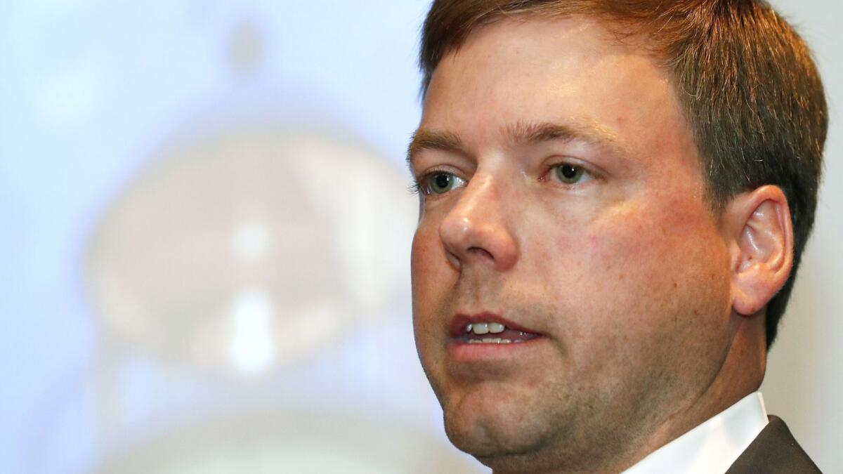 State Rep. Robert Foster, a candidate for the Republican nomination for governor of Mississippi, speaks at a candidates forum in Biloxi in June.