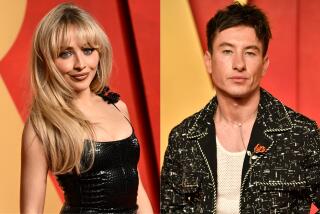 Sabrina Carpenter and Barry Keoghan arrive at the Vanity Fair Oscar party in Beverly Hills, Calif., on Sunday.