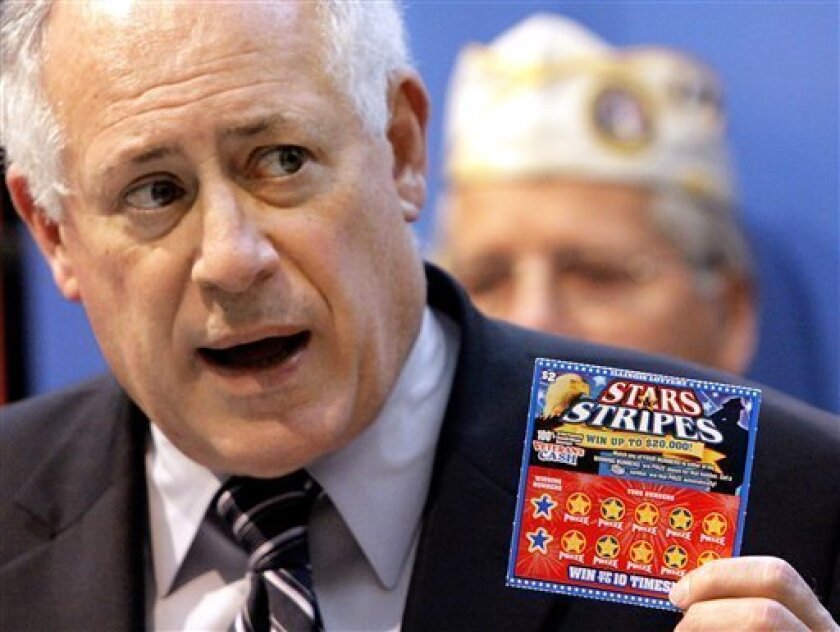 FILE - In this Oct. 28, 2009 file photo, Illinois Gov. Pat Quinn shows off the Veteran's Cash scratch-off lottery ticket, the Stars & Stripes, in Springfield, Ill. Two weeks before Gov. Pat Quinn is set to award one of Illinois' most lucrative contracts ever _ private management of the state's $2 billion-a-year lottery _ some are criticizing the process as secretive and complaining that it was structured to favor one bidder. (AP Photo/Seth Perlman, File)