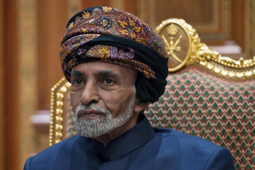FILE - In this Monday, Jan. 14, 2019 file photo, Sultan of Oman Qaboos bin Said sits during a meeting with Secretary of State Mike Pompeo at the Beit Al Baraka Royal Palace in Muscat, Oman. State media says Oman's ruler, Sultan Qaboos bin Said, has died, Saturday, Jan. 11, 2020. He was 79. The sultan has ruled Oman since overthrowing his father in a bloodless 1970 coup. (Andrew Caballero-Reynolds/Pool Photo via AP)