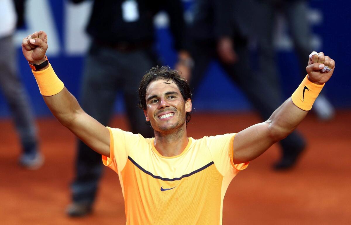 Rafael Nadal celebrates his victory over Kei Nishikori in the Barcelona Open championship match on April 24.