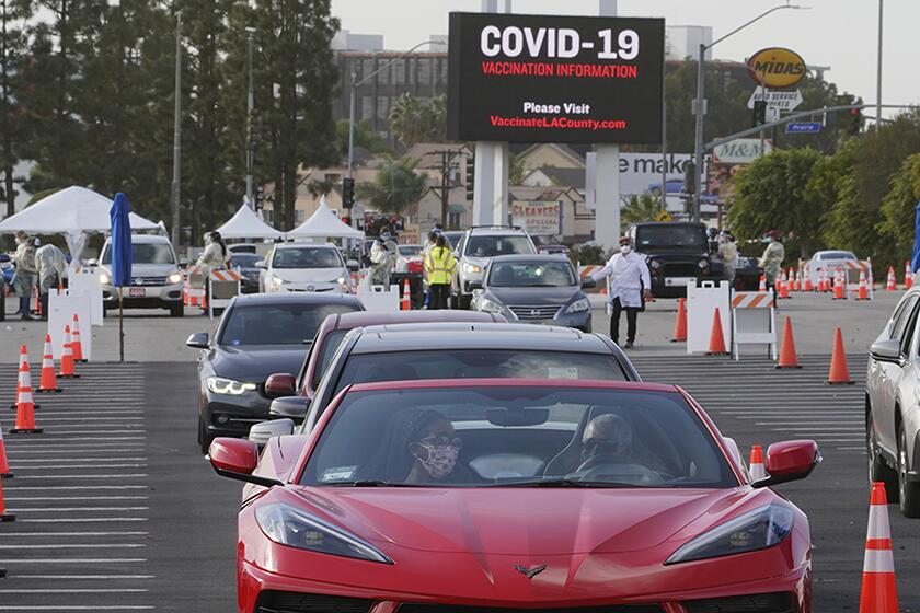 A mass COVID-19 vaccination site outside The Forum in Inglewood, Calif.