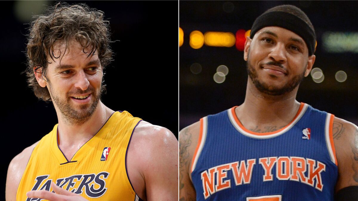 Pau Gasol, left, might consider re-signing with the Lakers if the team is able to land free-agent forward Carmelo Anthony.