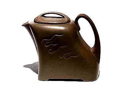 A curved teapot