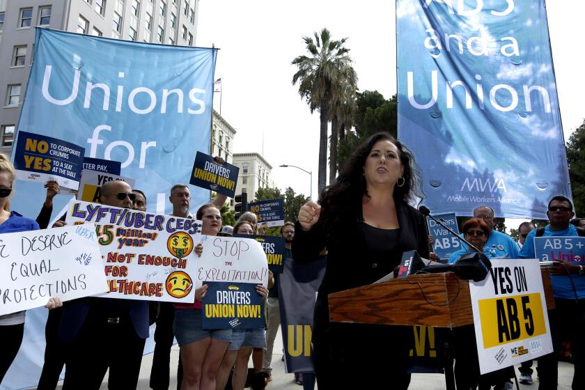 Assemblywoman Lorena Gonzalez, D-San Diego, speaks at rally calling for passage of her measure to limit when companies can label workers as independent contractors at the Capitol in Sacramento, Calif., Wednesday, Aug. 28, 2019. If approved by the legislature and signed by Gov. Gavin Newsom, AB5, would require companies like Uber and Lyft to treat their drivers like employees. (AP Photo/Rich Pedroncelli)