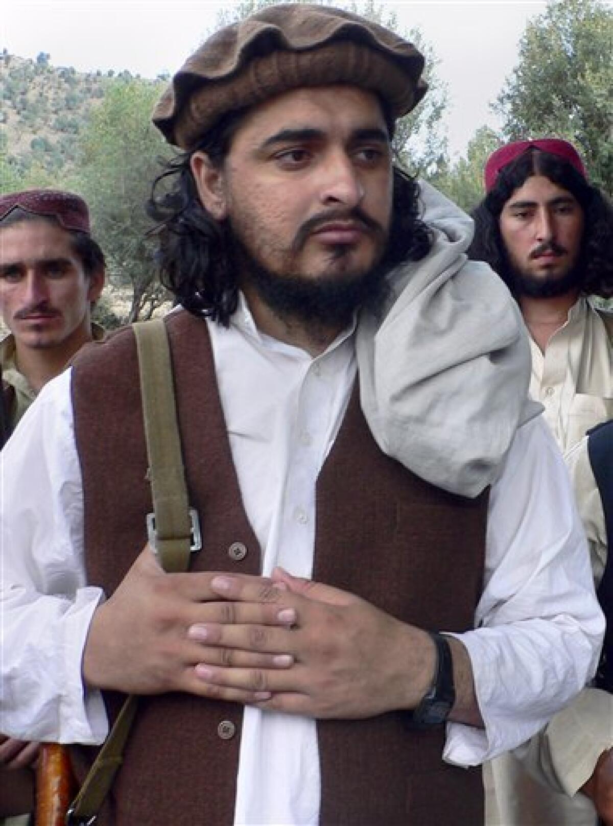 FILE - In this Oct. 4, 2009 file photo, Pakistani Taliban chief Hakimullah Mehsud arrives to meet with media in Sararogha of Pakistani tribal area of South Waziristan along the Afghanistan border. Mehsud is now believed to have survived a U.S. missile strike earlier this year, but has lost clout within the militant network, a senior intelligence officials said Thursday, April 29, 2010. (AP Photo/Ishtiaq Mehsud, File)