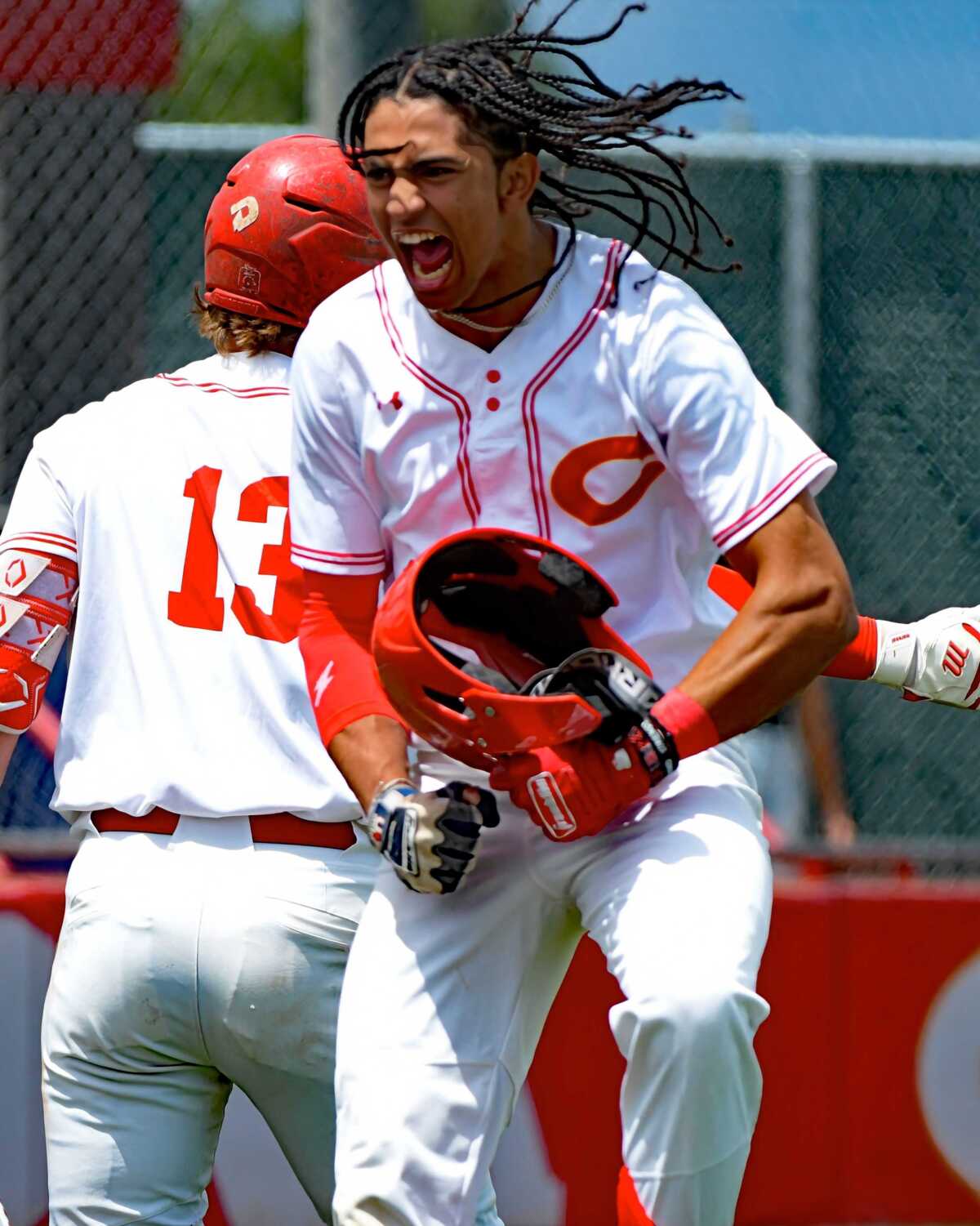 Freshman Anthony Murphy of Corona celebrates a walk-off win over top-seeded Notre Dame on Friday.