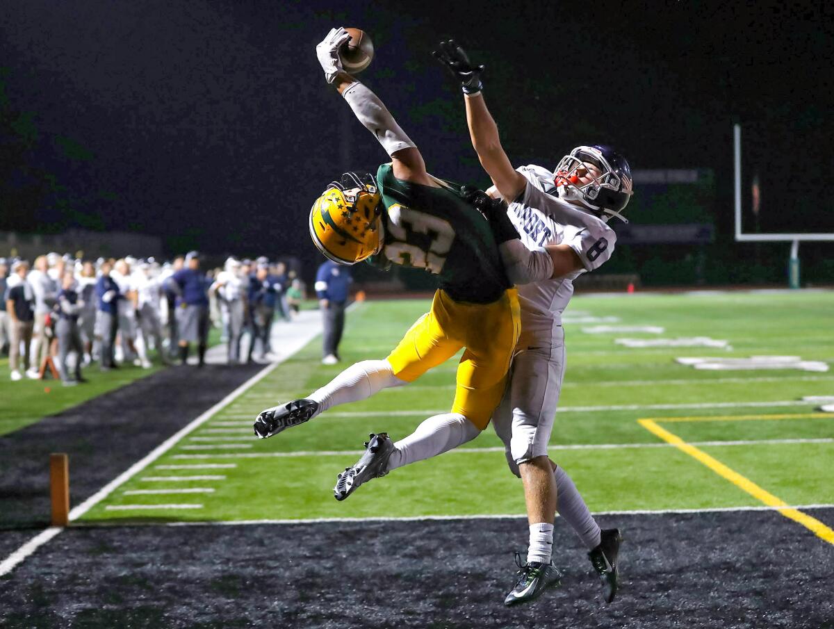 Edison's Nico Brown (23) makes an acrobatic catch for a touchdown.