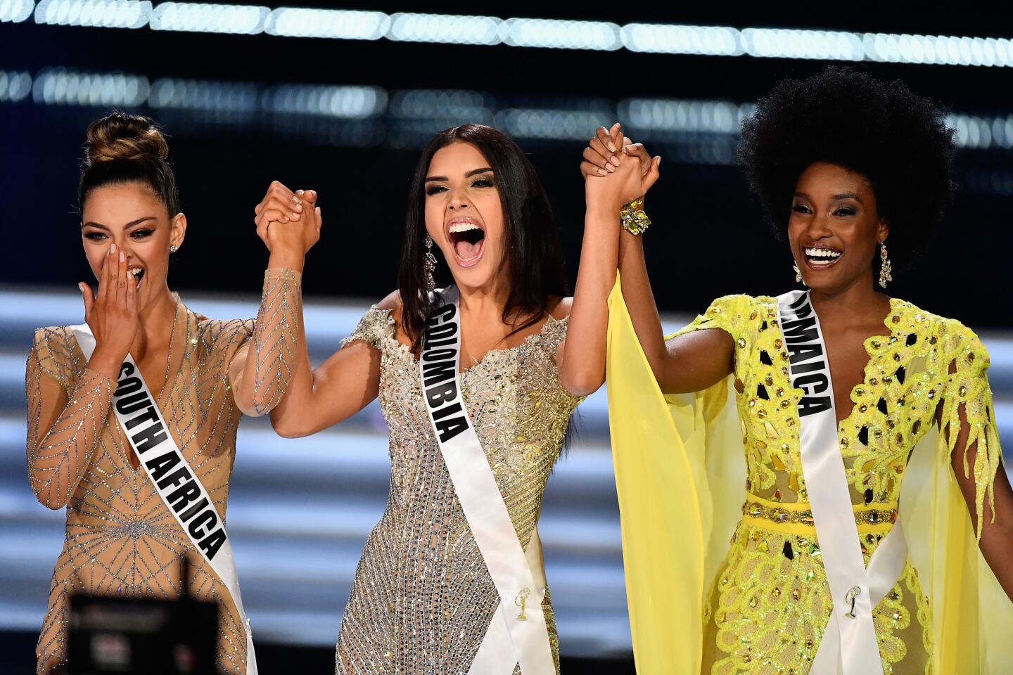 LAS VEGAS, NV - NOVEMBER 26: (L-R) Top 3 finalists Miss South Africa 2017 Demi-Leigh Nel-Peters, Miss Colombia 2017 Laura Gonzalez, and Miss Jamaica 2017 Davina Bennett compete during the 2017 Miss Universe Pageant at The Axis at Planet Hollywood Resort & Casino on November 26, 2017 in Las Vegas, Nevada. (Photo by Frazer Harrison/Getty Images) ** OUTS - ELSENT, FPG, CM - OUTS * NM, PH, VA if sourced by CT, LA or MoD **