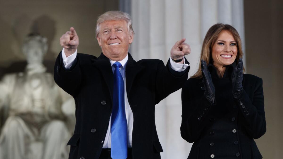 Donald Trump, left, and his wife, Melania Trump, at the "Make America Great Again Welcome Concert" at the Lincoln Memorial on Jan. 19, 2017.