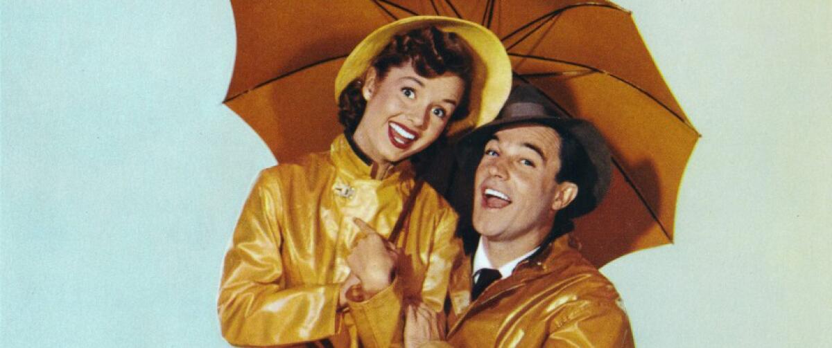 Gene Kelly and Debbie Reynolds in the classic 1952 MGM musical “Singin’ in the Rain”  