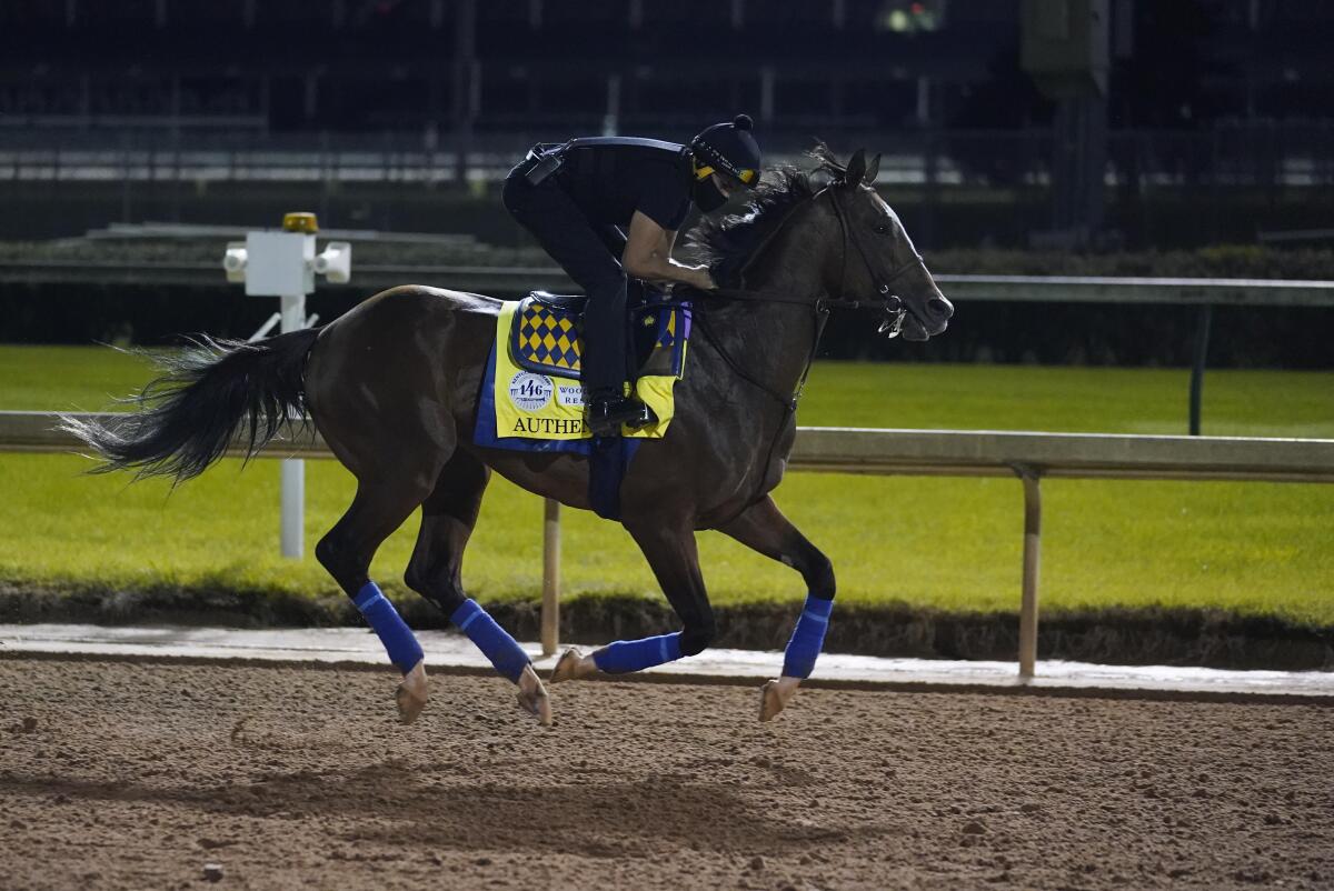 Kentucky Derby entry Authentic runs during a workout at Churchill Downs on Friday.