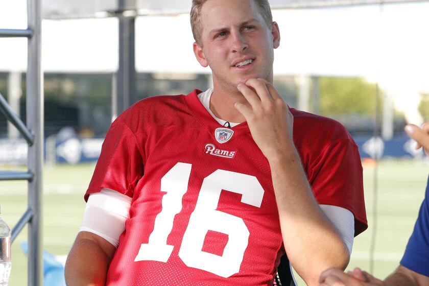 Rams quarterback Jared Goff talks with a reporter during a press conference at the first day of the Los Angeles Rams training camp at UC Irvine on Saturday, July 27, 2019.