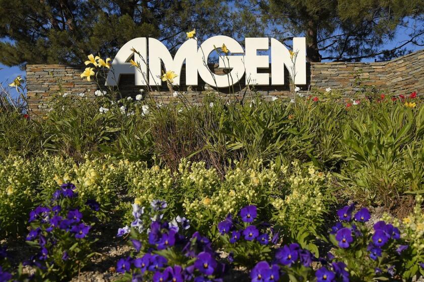 The entrance to Amgen is seen, Sunday, Nov. 9, 2014, in Thousand Oaks, Calif. (AP Photo/Mark J. Terrill)