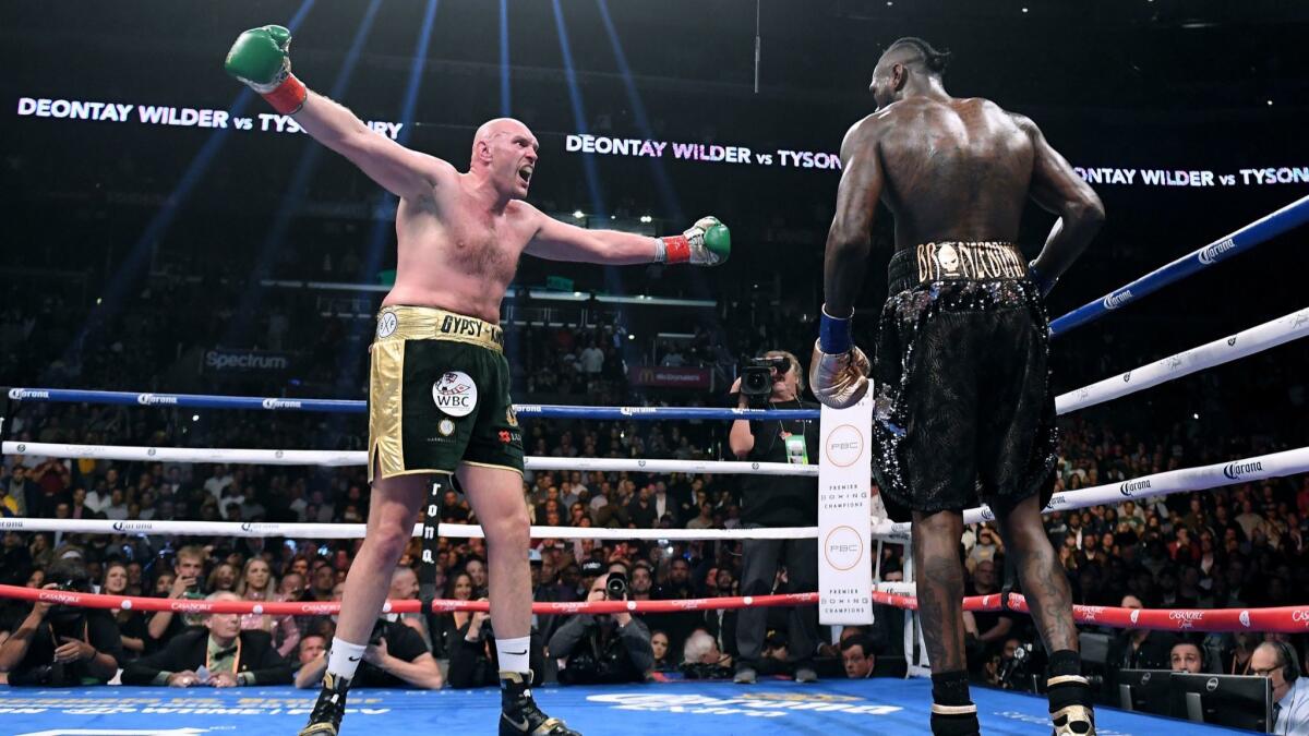 Tyson Fury taunts Deontay Wilder during their WBC heavyweight title fight on Dec. 1, 2018 at Staples Center. The bout ended in a split-decision draw.