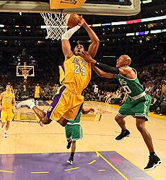 Kobe Bryant is fouled by the Celtics' Ray Allen as he goes up for a shot.