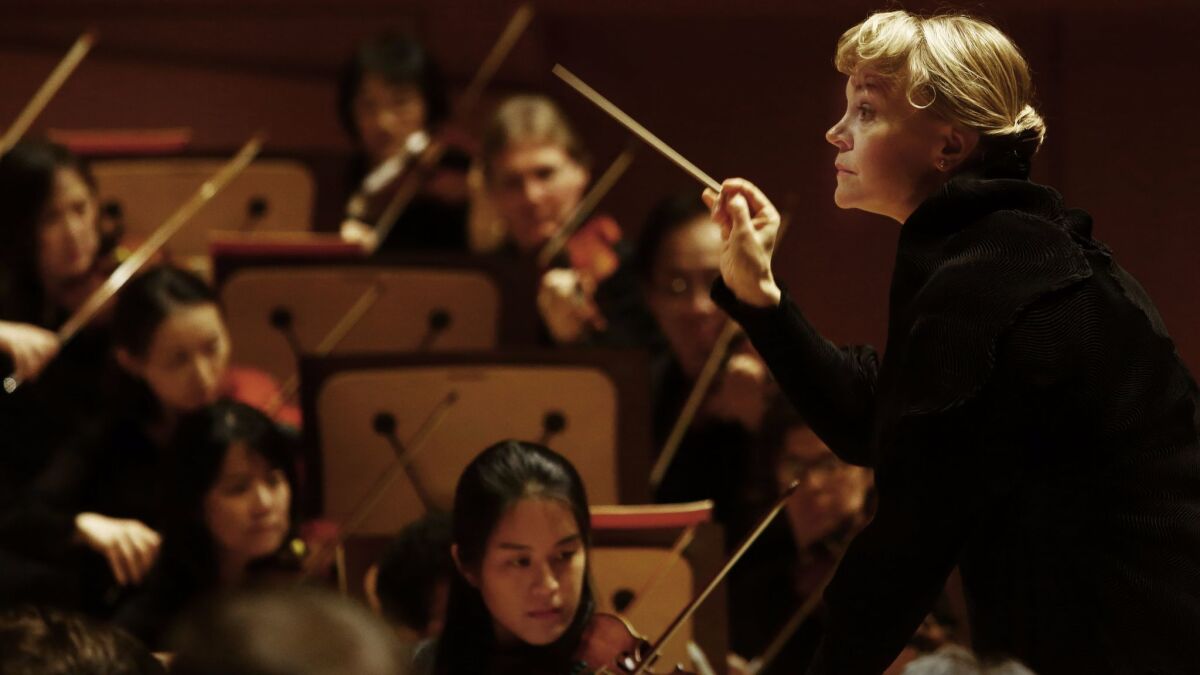 Susanna Mälkki began her appointment as Los Angeles Philharmonic's principal guest conductor with the U.S. premiere of a major new violin concerto by Luca Francesconi, with Leila Josefowicz as soloist.