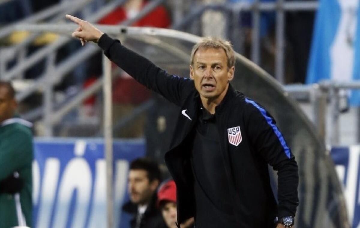 U.S. Coach Juergen Klinsmann instructs his team during a World Cup qualifyin match against Guatemala on March 29.