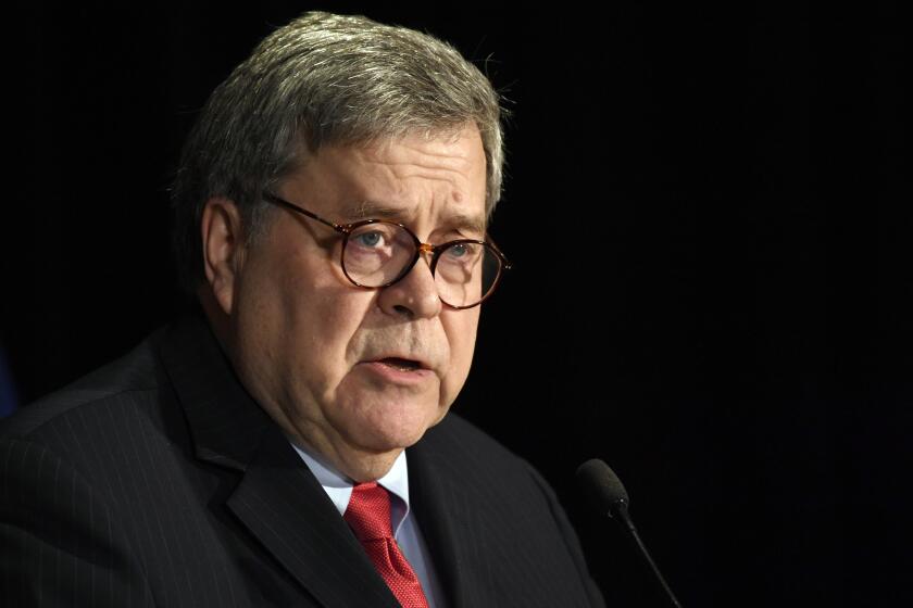 FILE - In this Feb. 10, 2020, file photo, Attorney General William Barr speaks at the National Sheriffs' Association Winter Legislative and Technology Conference in Washington. (AP Photo/Susan Walsh, File)